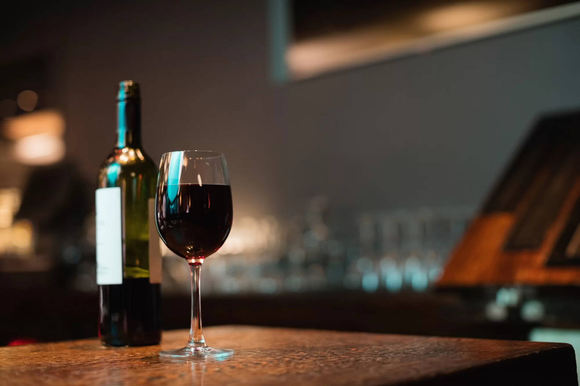 glass red wine bottle bar counter 3